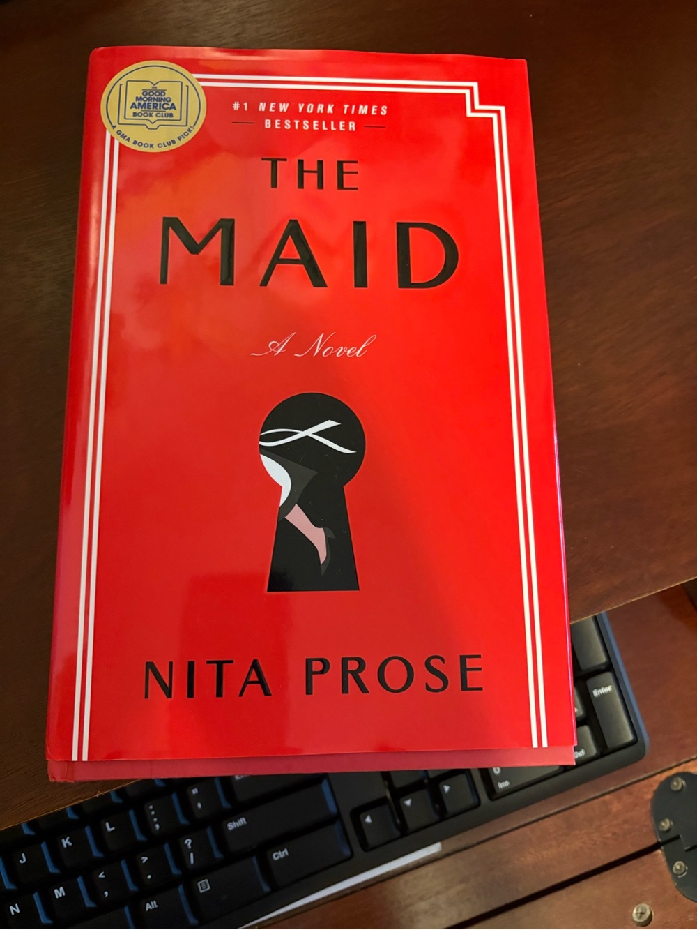 The Maid Hardcover Book - Red